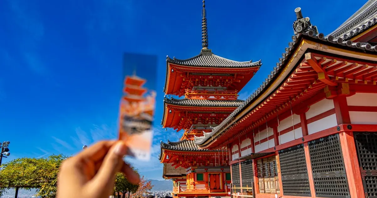 Suica and ICOCA IC transit cards for Japan travel on a wooden surface