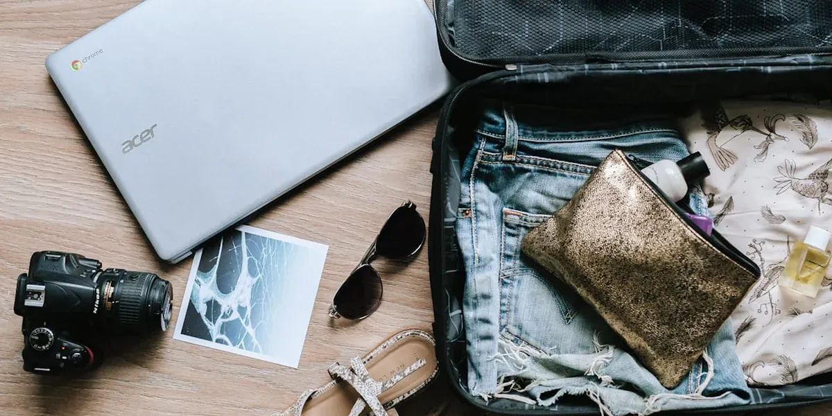 A laptop open to a travel booking website, illustrating online hotel research