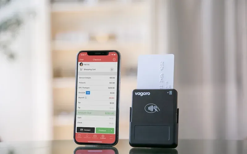iPhone being tapped at a contactless payment reader in Japan