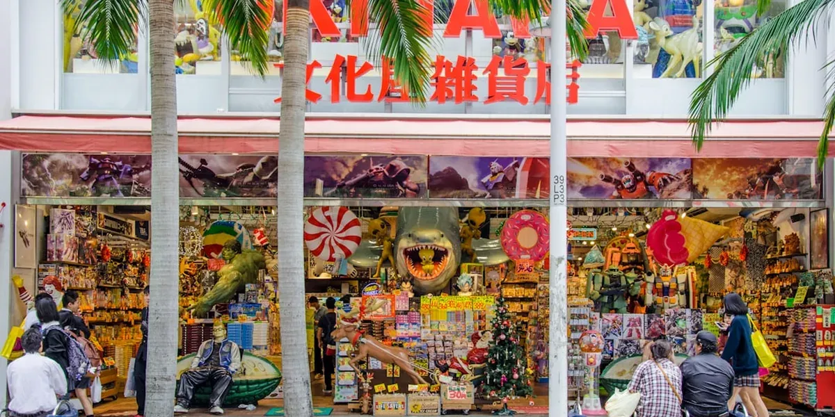 Makishi Public Market in Naha with fresh tropical fish, Okinawan purple sweet potatoes, and tropical fruits on display