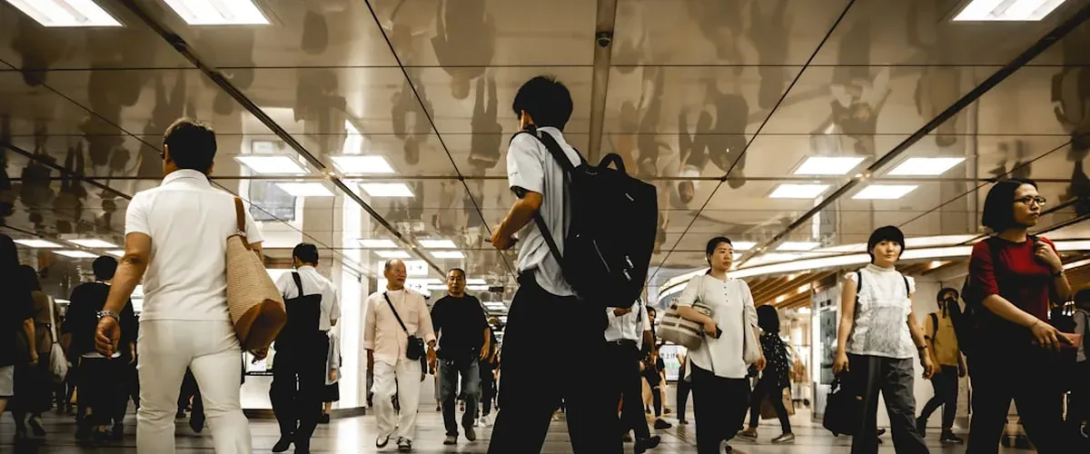 Extremely crowded Japanese train station during Golden Week national holiday