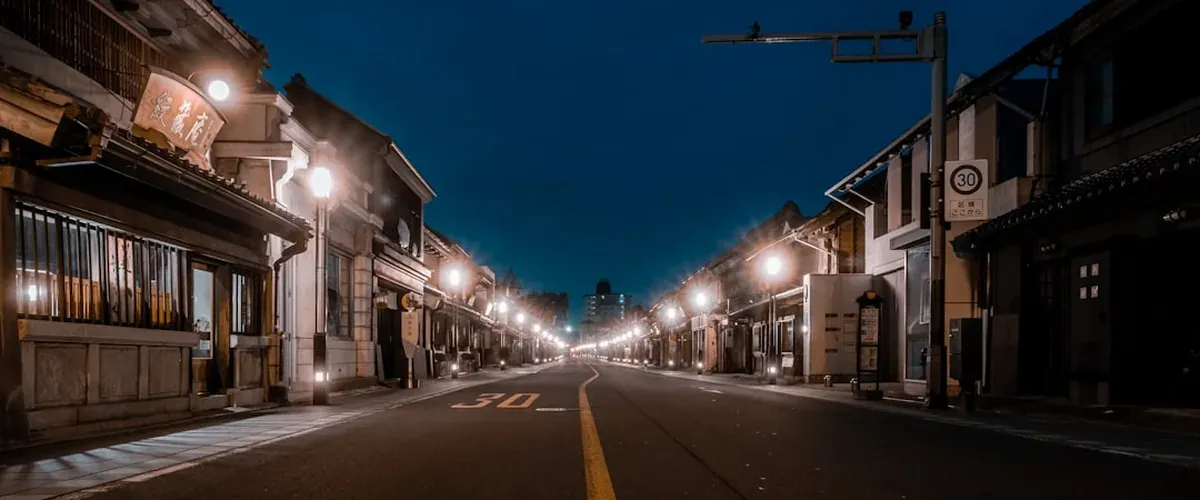 Traditional wooden buildings along a stone-paved street in Kawagoe old town