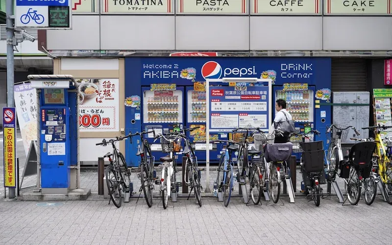 Tapping an IC card at a Japanese convenience store register