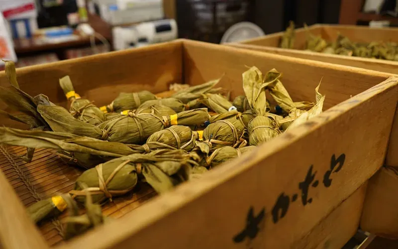 Fresh mochi being pounded at a traditional Nara street food stall