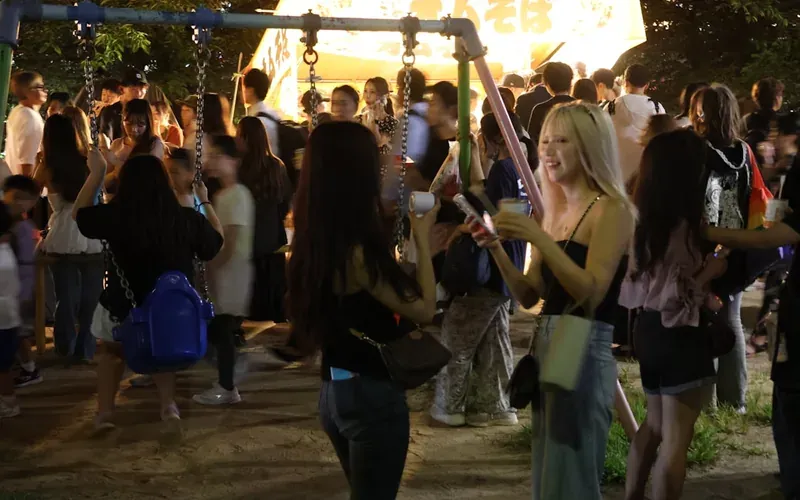 Osaka summer street festival with colourful lanterns and evening crowds