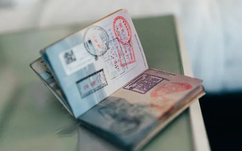 Travel documents, passport, and insurance policy printed and ready for Japan trip